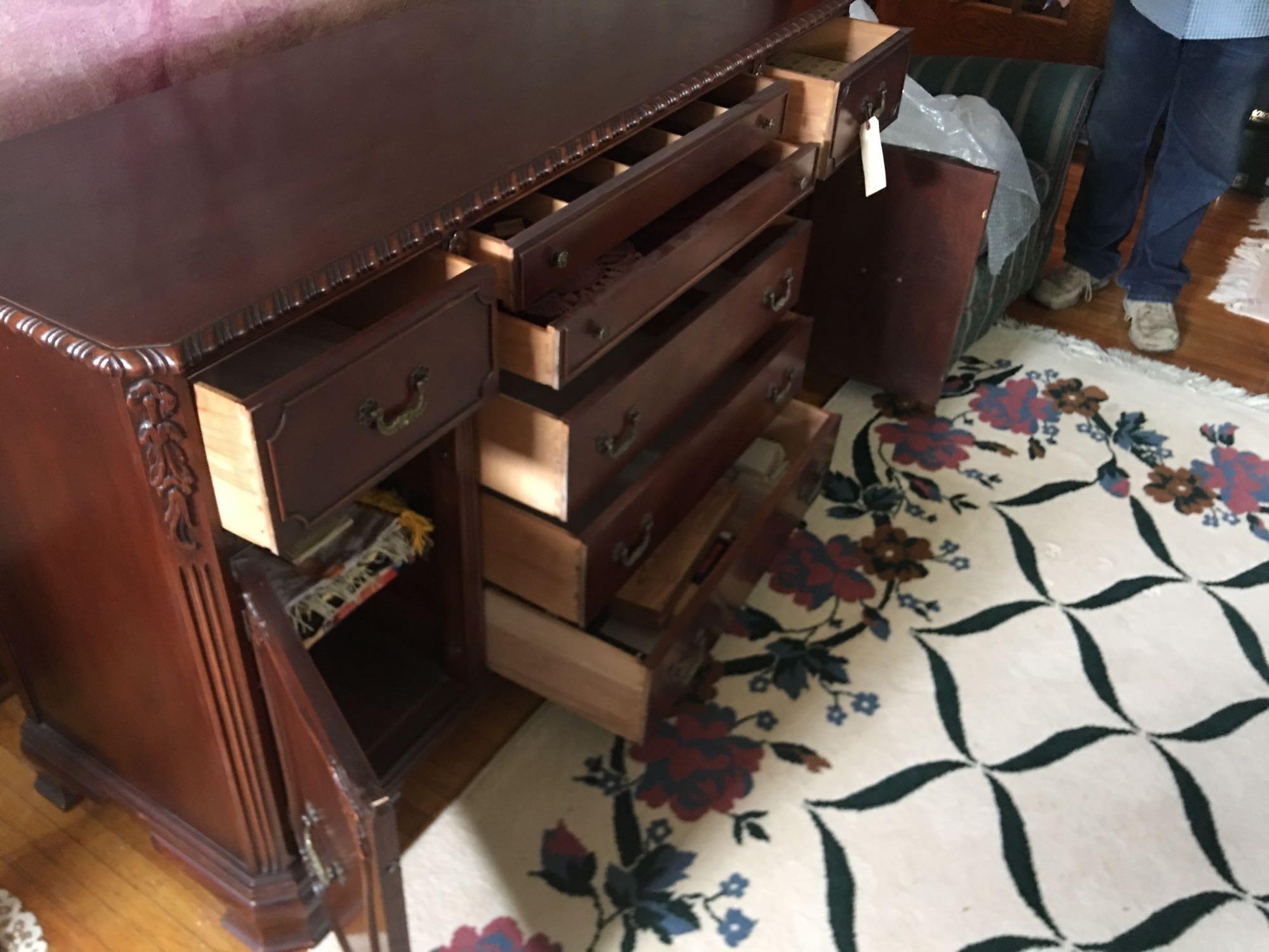 Mahogany buffet 20'' d, 63'' l, 35'' h, with silverware drawers, china storage, three drawer