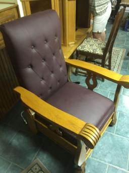 Oak reclining leather chair with lion hand rest and lion front feet, excellent condition.
