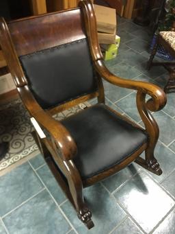 Oak sturdy rocker with claw feet on the front runners, leather seat and back (Excellent condition)