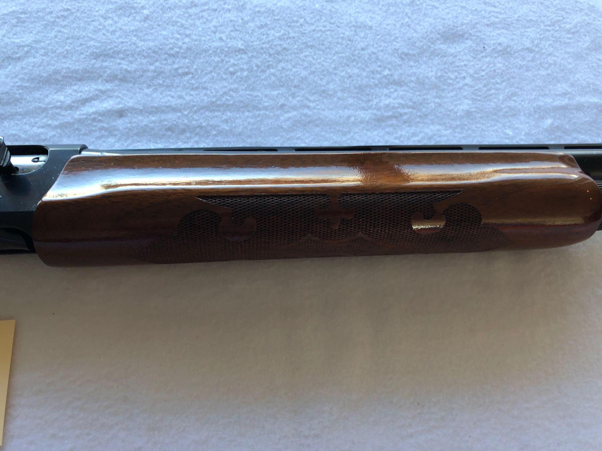 Remington Model 1100, 12 ga. Engraved