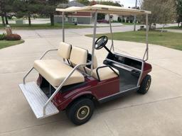 1999 Golf Car IR, ''Golf Cart'', 4 seat, gas engine, maroon color, VIN AG9938-802905, runs good!