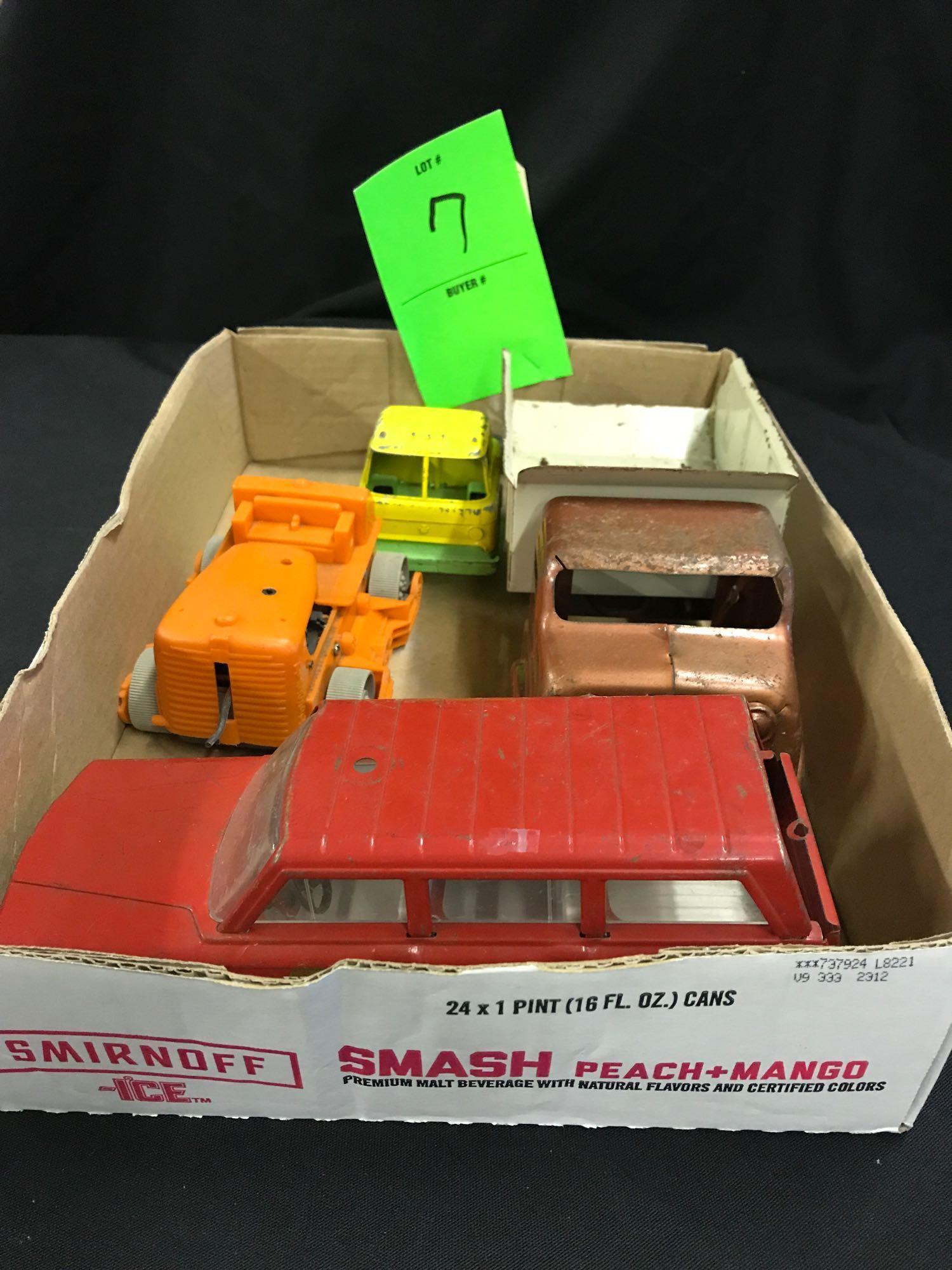 Assortment of Trucks and Toys