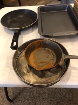 9 x 13 deep backing pans, plus larger cookie sheets, kettle and cast iron skillet.