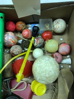 Assortment of Sling Shots, Balls and Various Toys