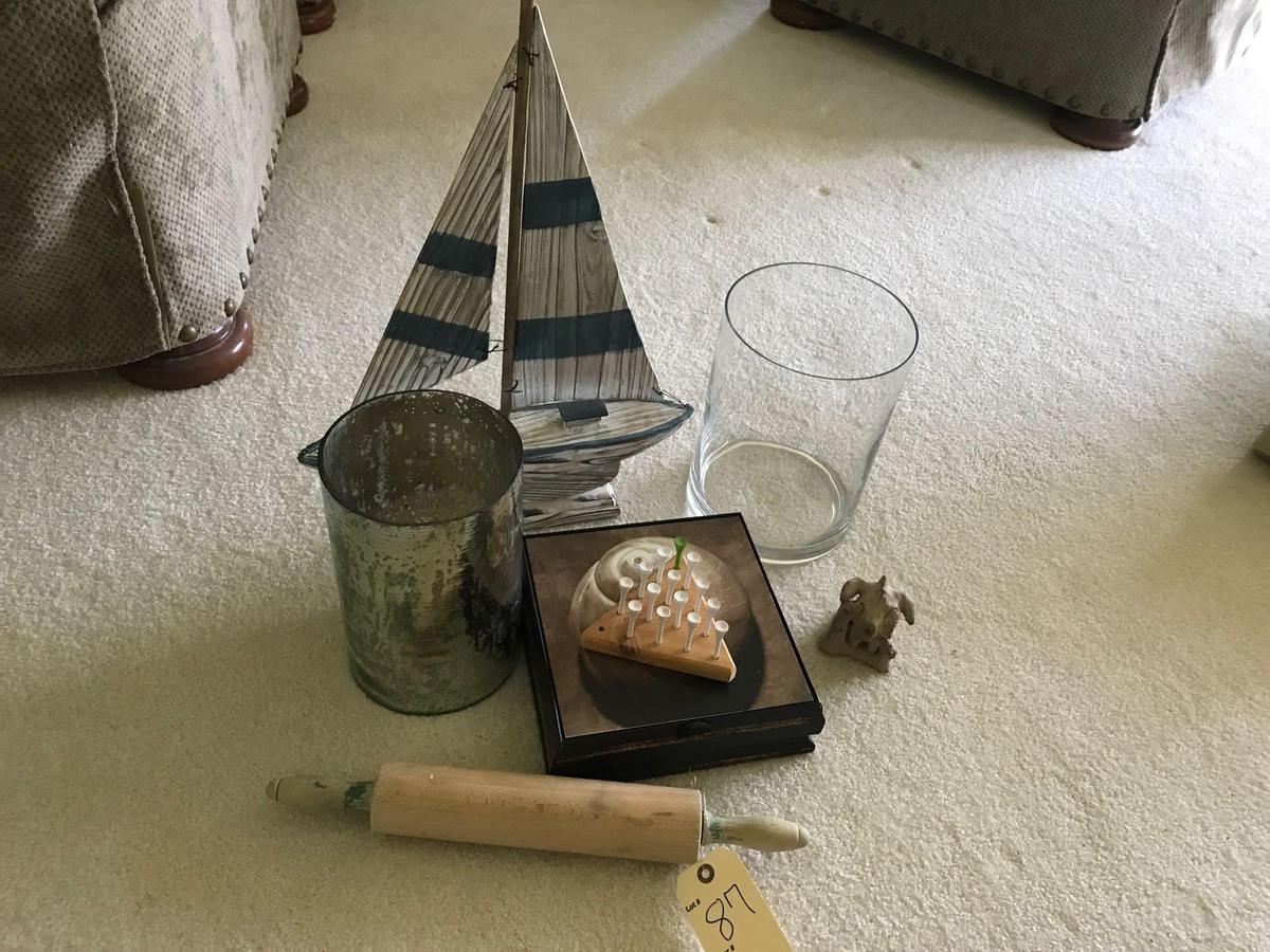 Assortment of d?cor items, to include wooden sail boat, wood rolling pin, wood box, glass vase and