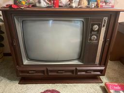 Card table, 25 inch console TV and chair