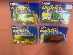 8- Corgi Toys delivery trucks, in original packaging