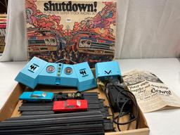 Shutdown Plymouth Super Stock Racing Set, in original box. Red car undercarriage is broke per