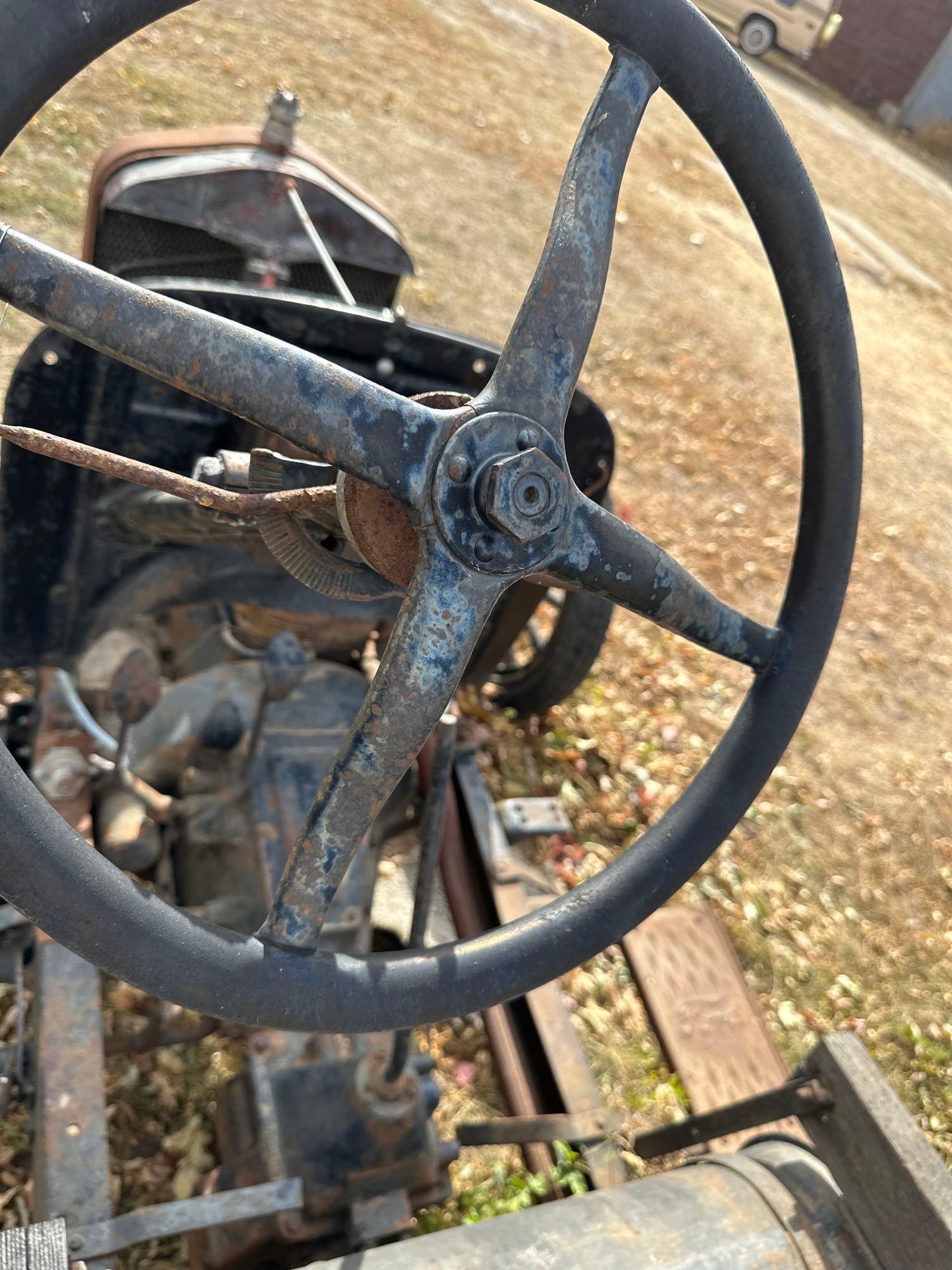 1920's truck with flatbed, wood spoke wheels, not title and non runner