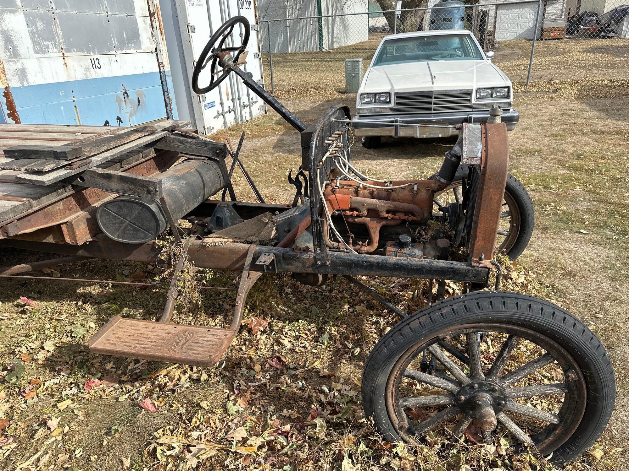 1920's truck with flatbed, wood spoke wheels, not title and non runner