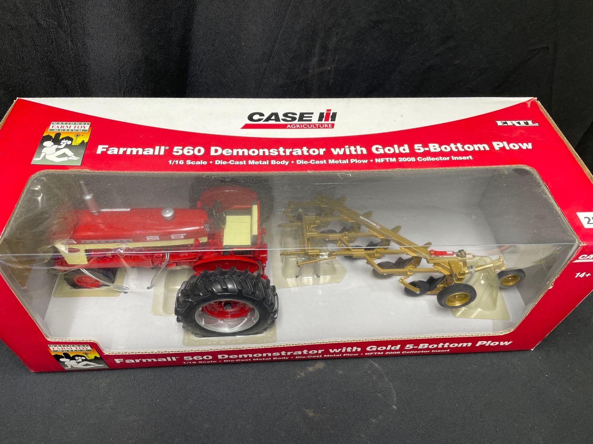 1/16th Scale Ertl National Farm Toy Museum Farmall 560 Demonstrator w/Gold 5 bottom plow - NIB