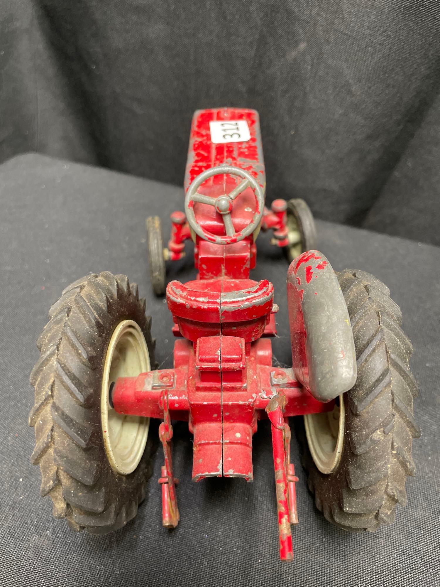 1/16th Scale Ertl IH 340 Utility Tractor with 2 pt. hitch - Left rear fender missing