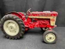 1/16th Scale Ertl IH 340 Utility Tractor with 2 pt. hitch - Left rear fender missing