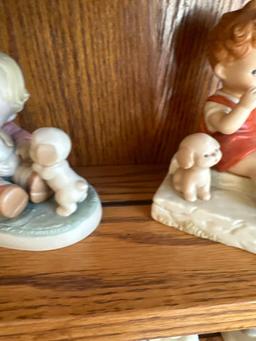 6 Enesco porcelain figurines. Shipping