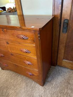 4 drawer HANDMADE dresser with applied carving handles... Nice.