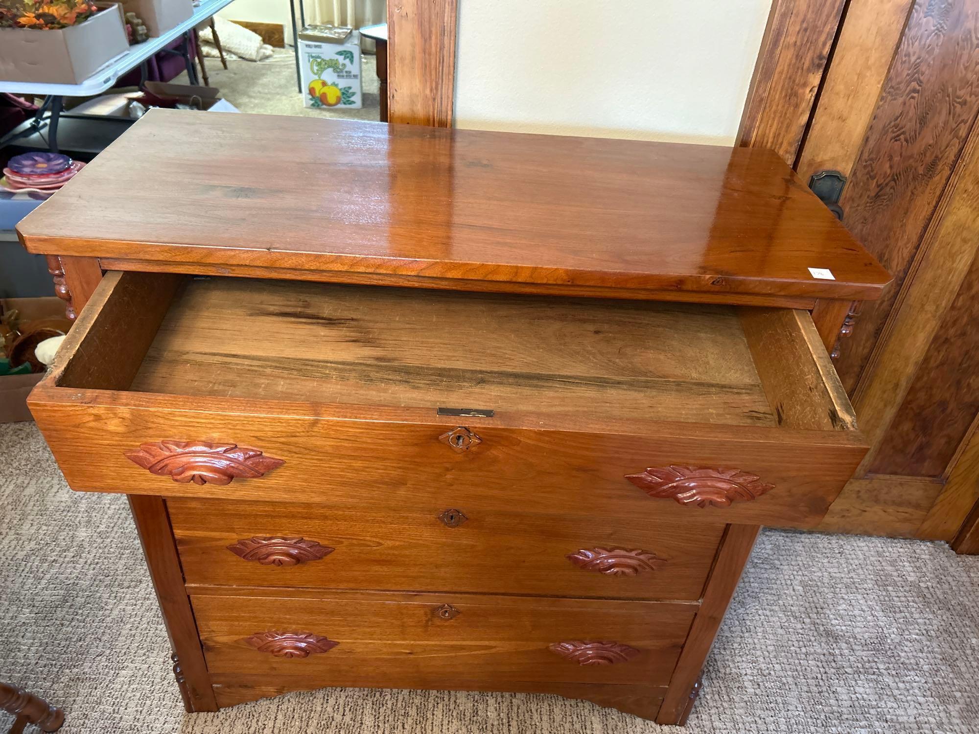 4 drawer HANDMADE dresser with applied carving handles... Nice.