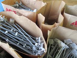 10 bags of peg board display hooks & a pile on floor