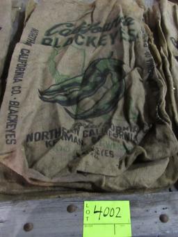 4 gunny sacks, CA Blackeyes, CA small white beans & MI Navy Beans