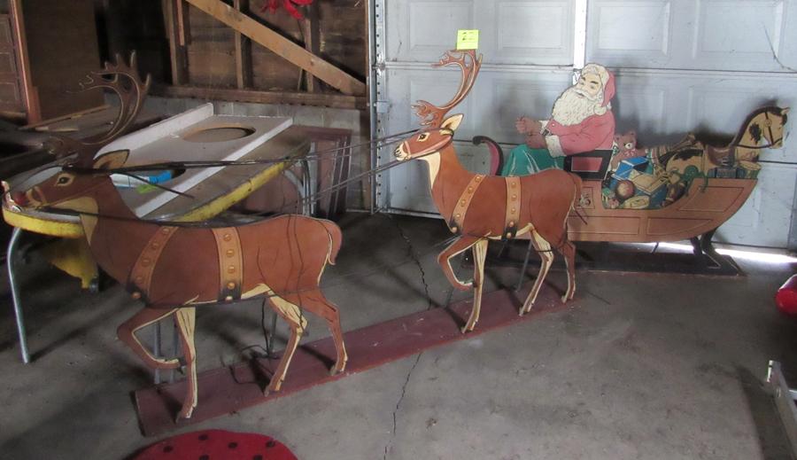 Santa on sleigh yard art