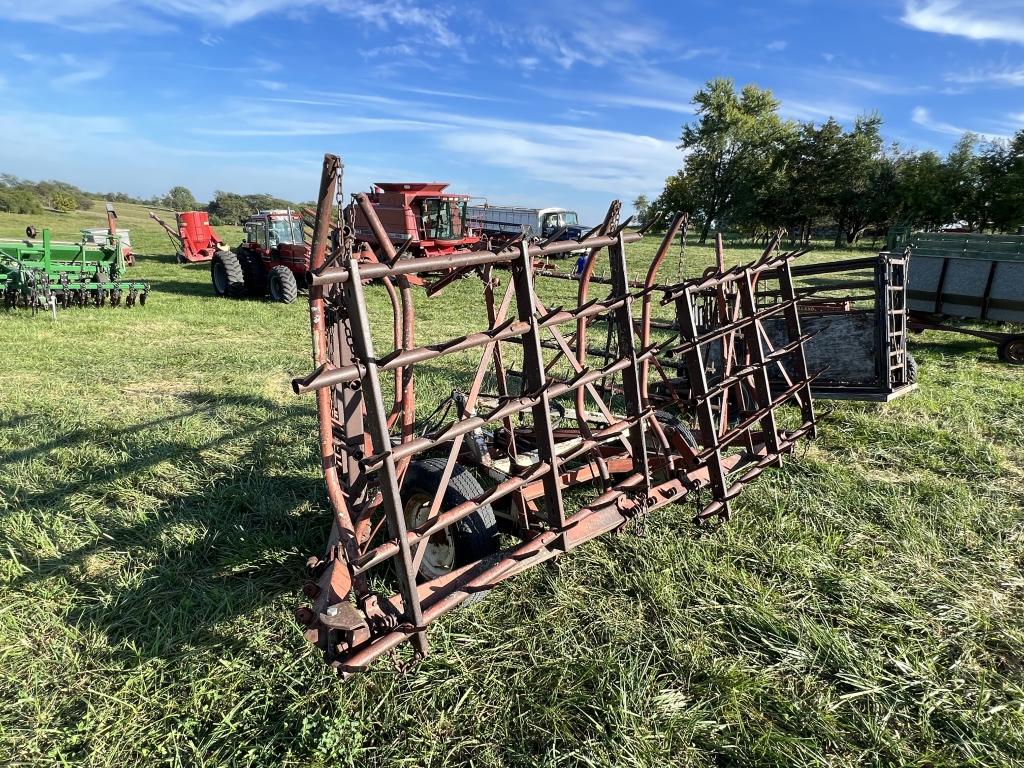 Spiked tooth harrow on cart