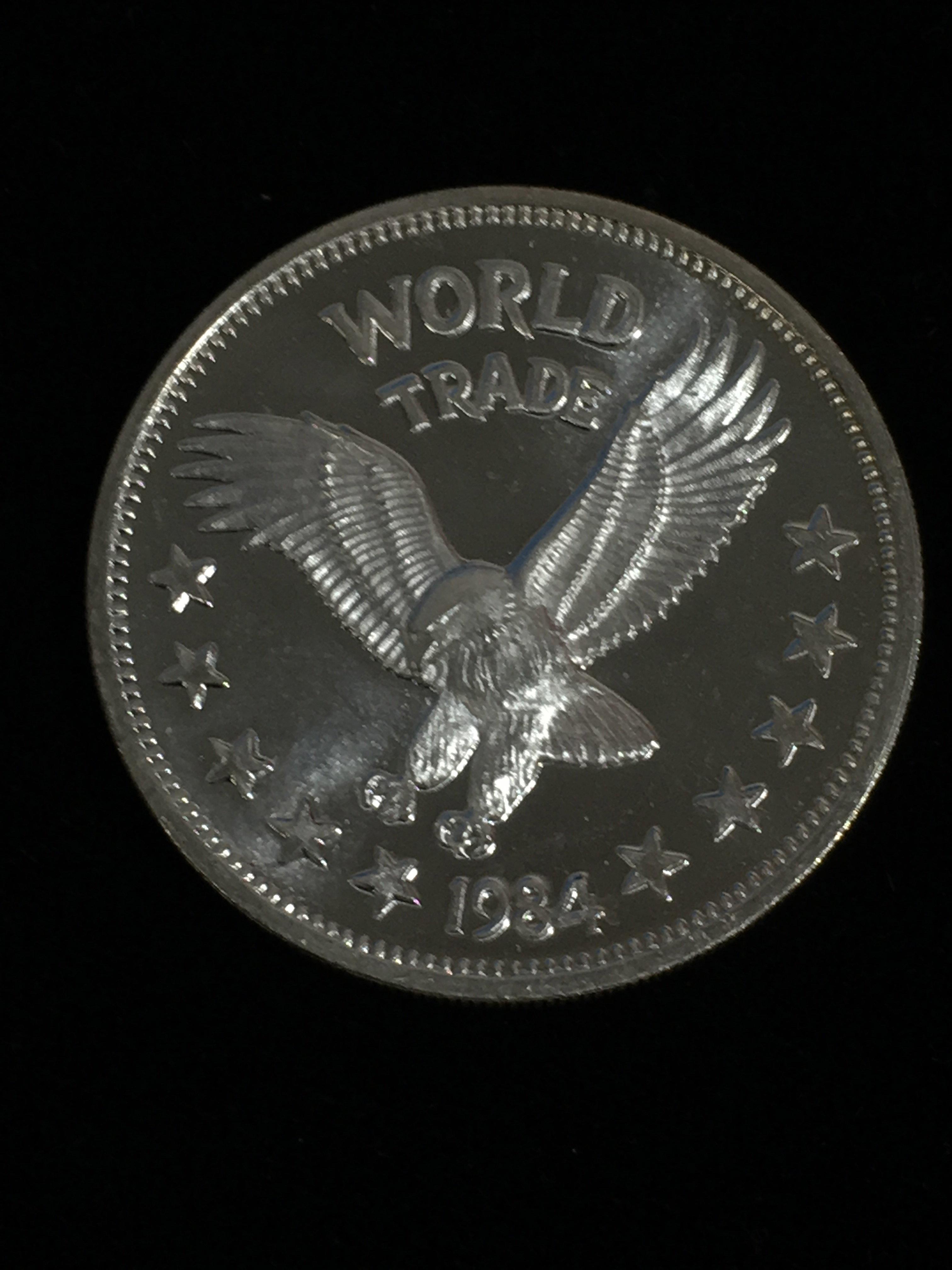 1 Troy Ounce .999 Fine Silver World Trade Unit 1984 Eagle Silver Bullion Round Coin