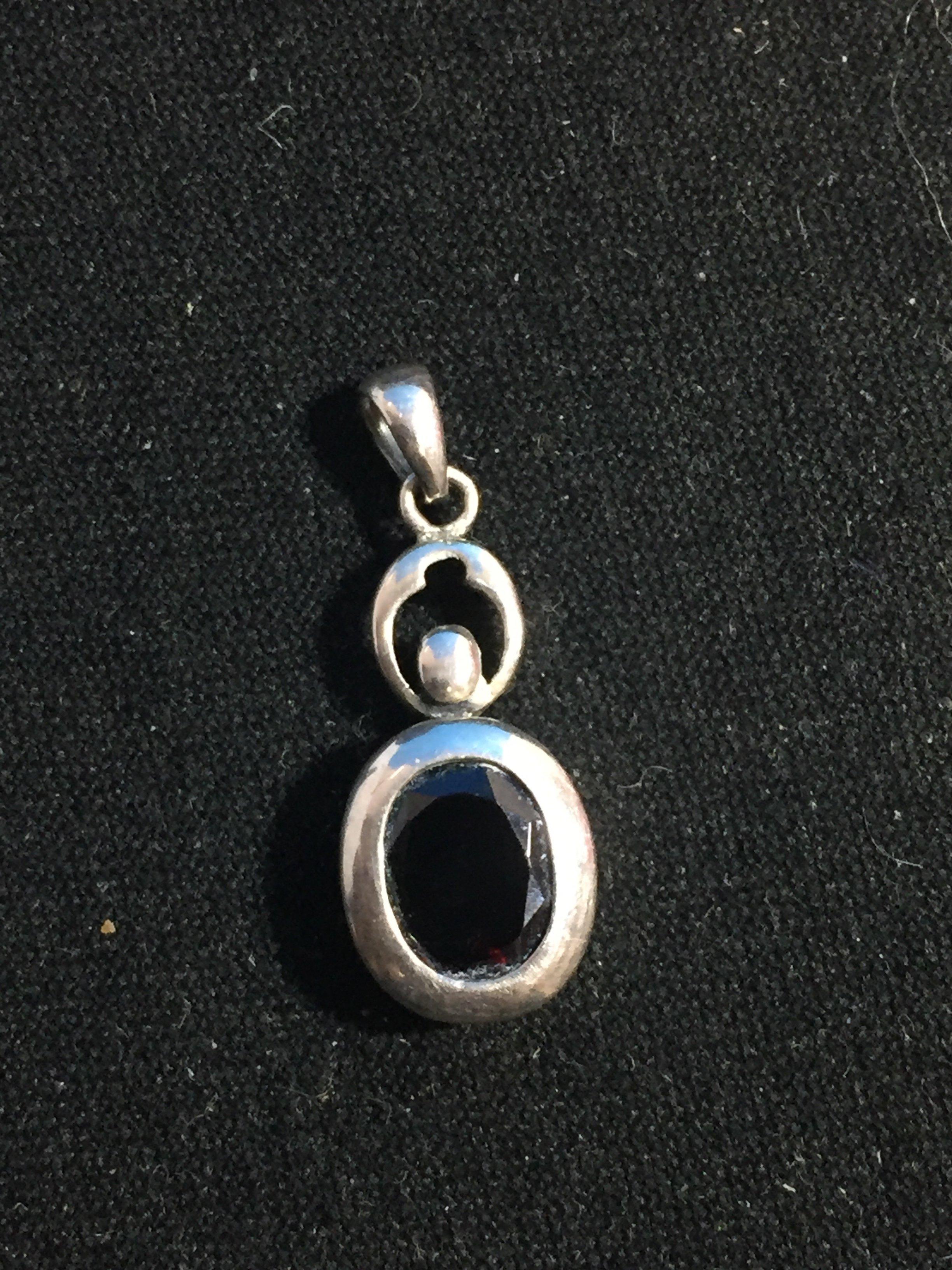 LUC Sterling Silver & Red Garnet Pendant