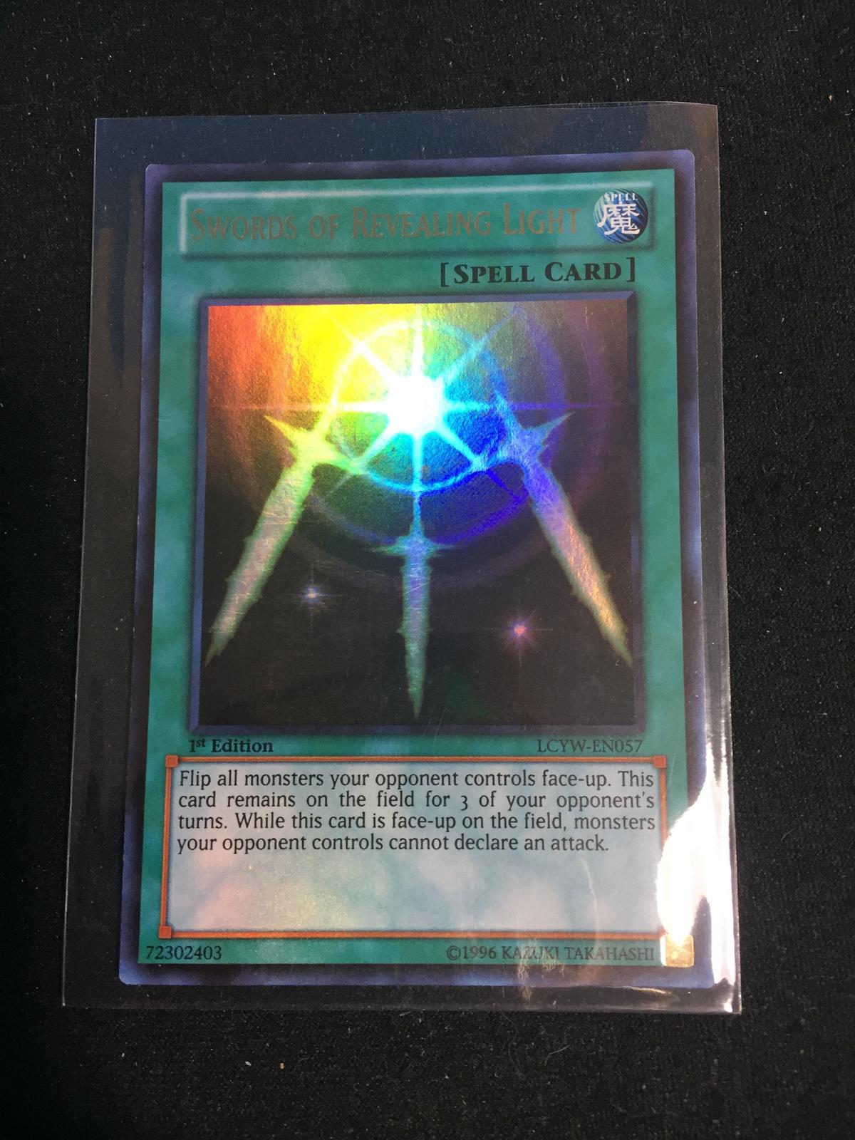 Holo Yu-Gi-Oh! Card - Swords of Revealing Light LCYW-EN057