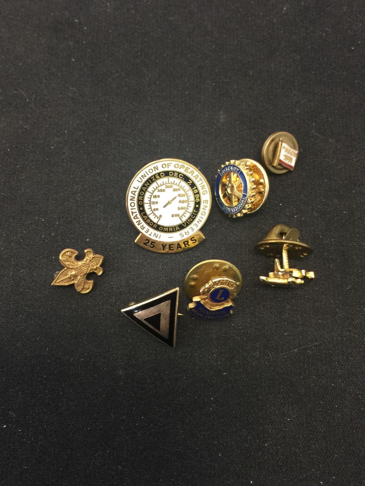 Lot of Seven Gold-Tone Club Themed Commemorative Alloy Pins