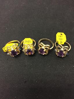 Lot of Four Matched Oval Faceted 9x7mm Purple Gem Center Gold-Tone Alloy Rope Accented Ring Band