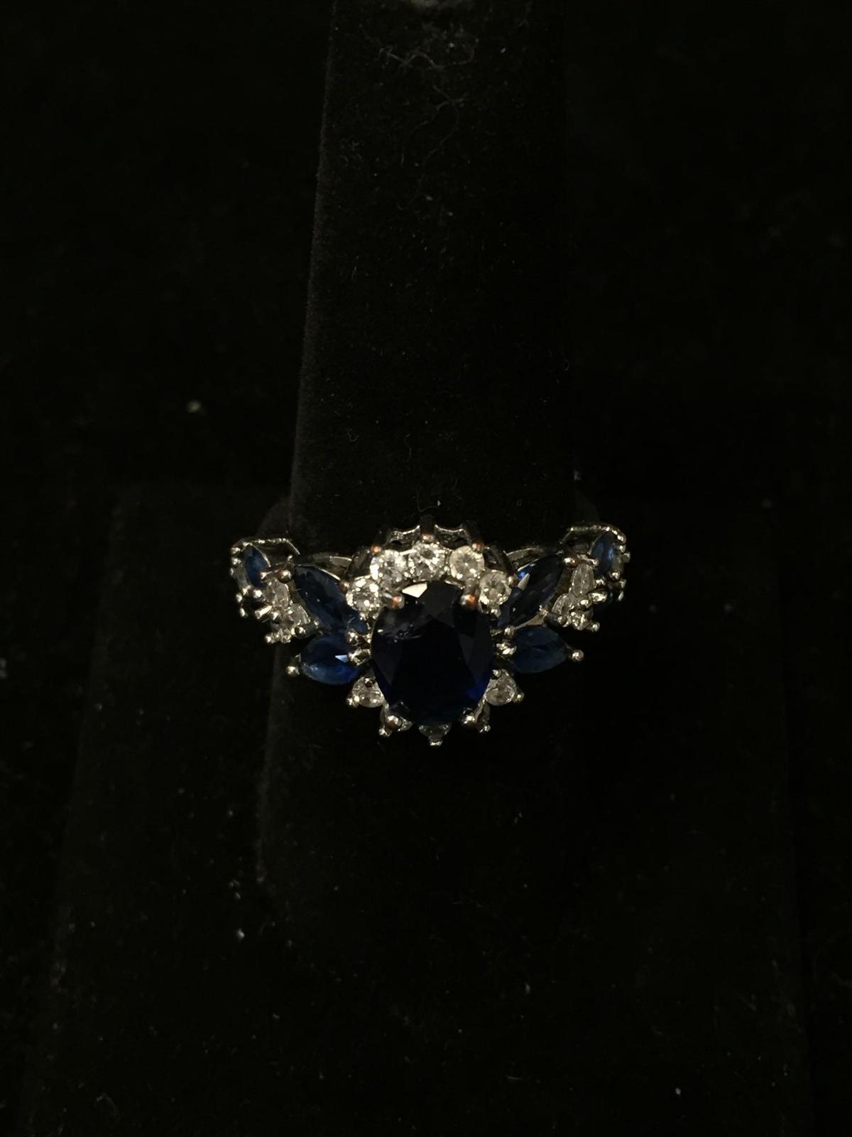 Oval Faceted 9x7mm Created Blue Sapphire Center w/ White Zircon Halo & Marquise Sapphire Sides