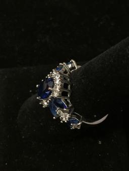 Oval Faceted 9x7mm Created Blue Sapphire Center w/ White Zircon Halo & Marquise Sapphire Sides