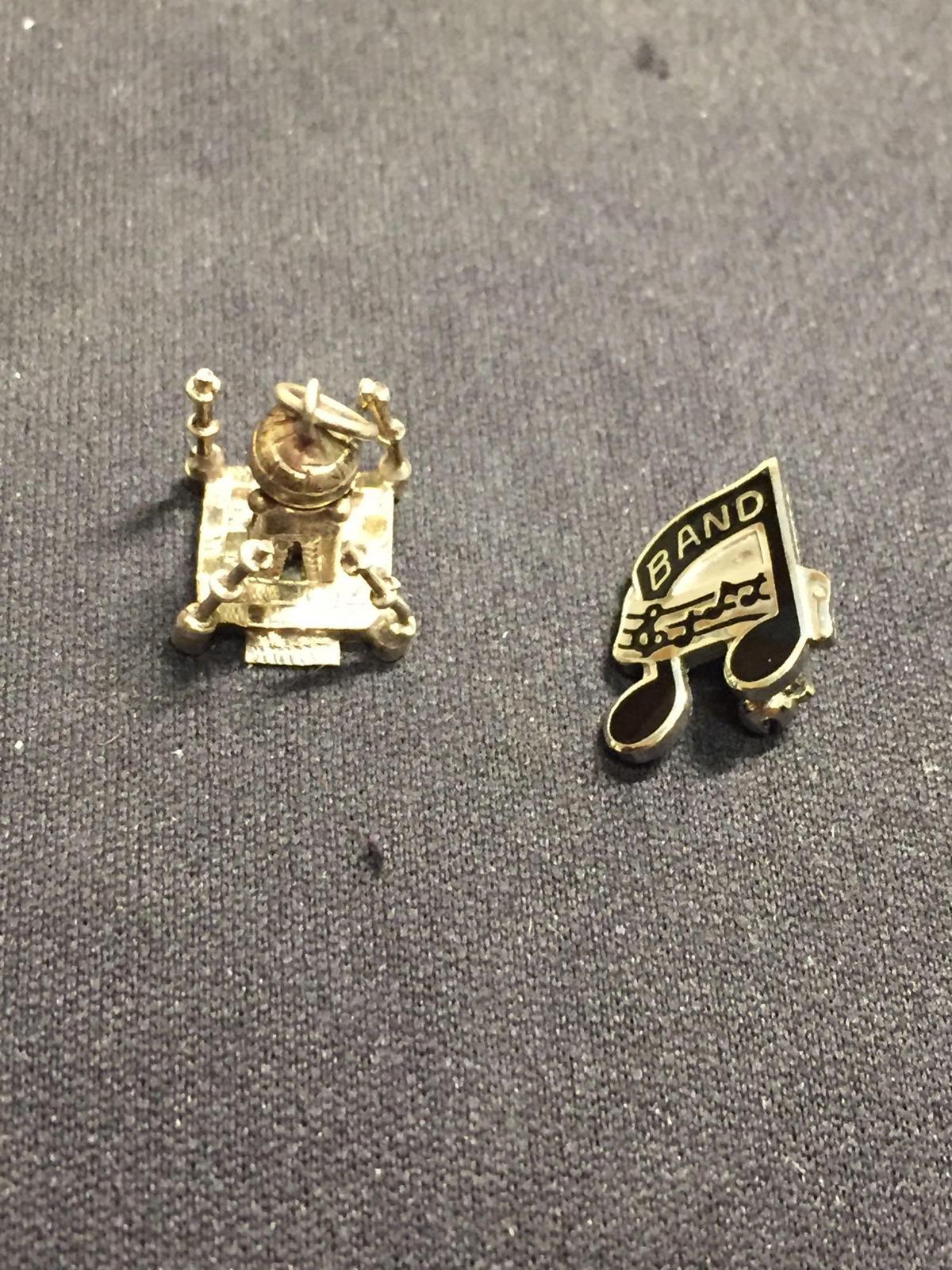 Lot of Two Sterling Silver Items, One Black Enameled Music Note Pin & Taj Mahal Themed Charm