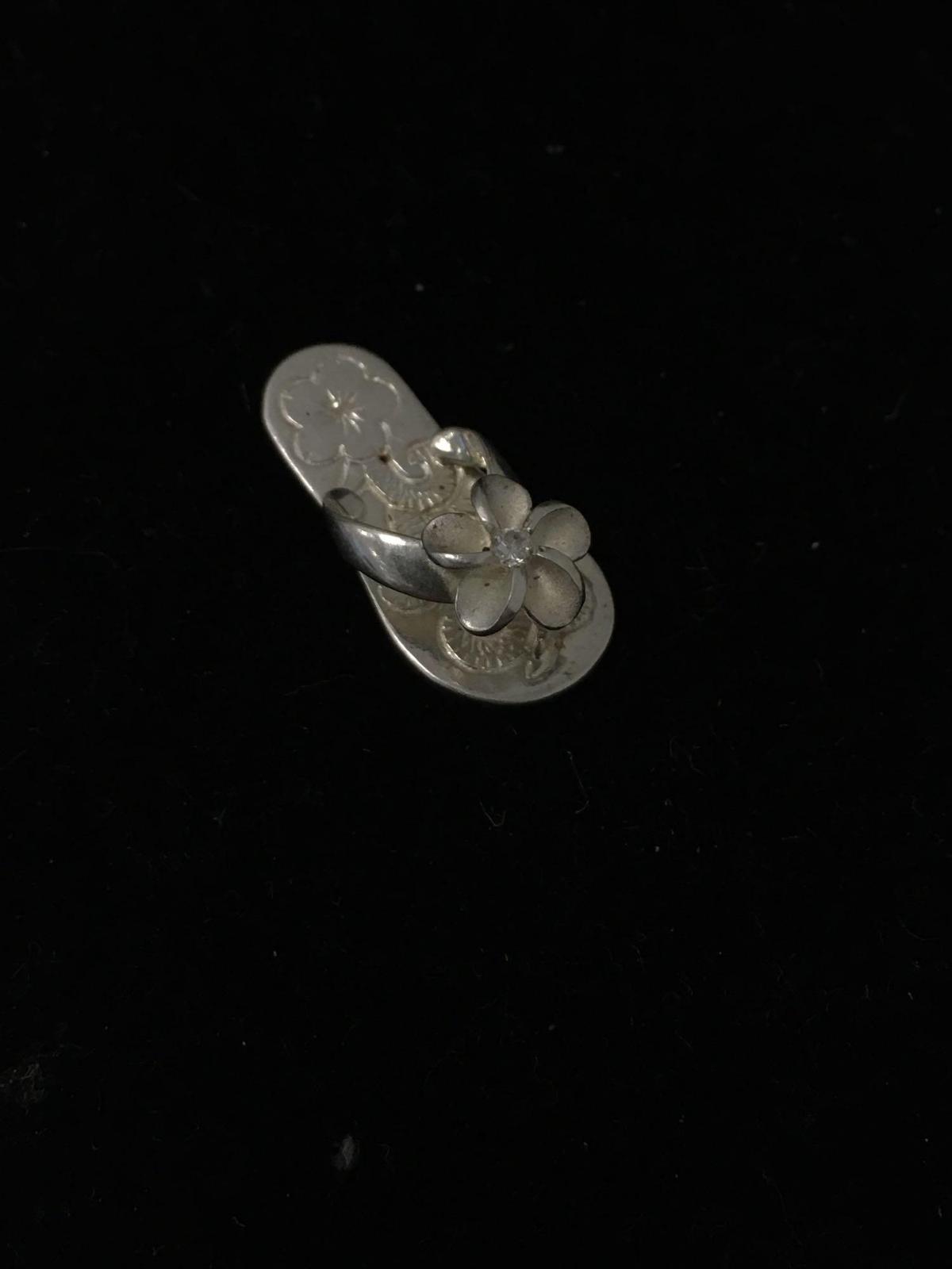 Hawaiian Flower Style 1in Long Sterling Silver Flip Flop Pendant w/ Rhinestone Center