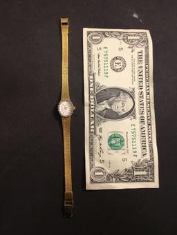 Pulsar Designer Oval 18x15mm Diamond Accented Bezel Gold-Tone Stainless Steel Watch w/ Bracelet