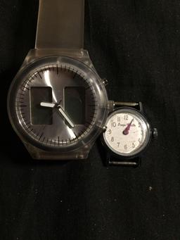 Lot of Two Watches, One Round 32mm Bezel Stainless Steel Watch & Resin Digital Watch & Loose Snow