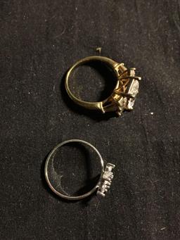 Lot of Two CZ Accented Alloy Ring Bands, One Gold-Tone Radiant Faceted Three-Stone & Silver-Tone