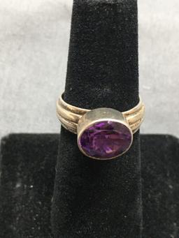 Horizontal Bezel Oval Faceted 10x8mm Amethyst Center Groove Detailed Sterling Silver Ring Band