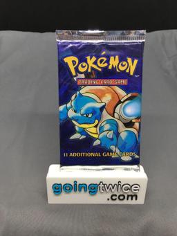 Factory Sealed 1999 Pokemon Base Set Unlimited 11 Card Booster Pack - Blastoise Art - 20.7 Grams