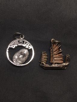 Lot of Two Sterling Silver Charms, One Chinese Themed Fishing Boat & One City of Calgary