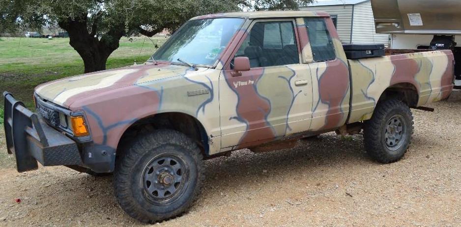 1986 Camo Nissan Ext. Cab 4x4 5speed