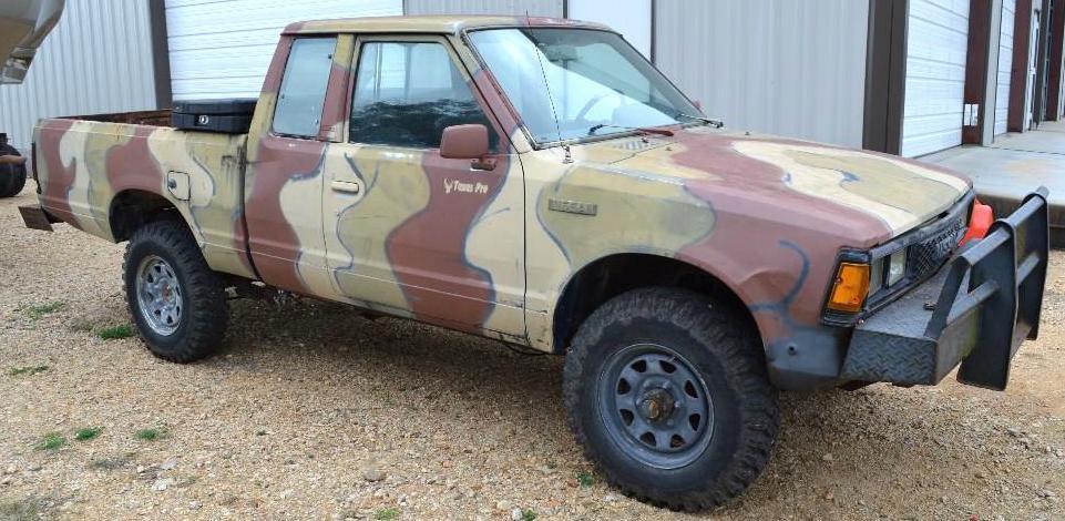 1986 Camo Nissan Ext. Cab 4x4 5speed