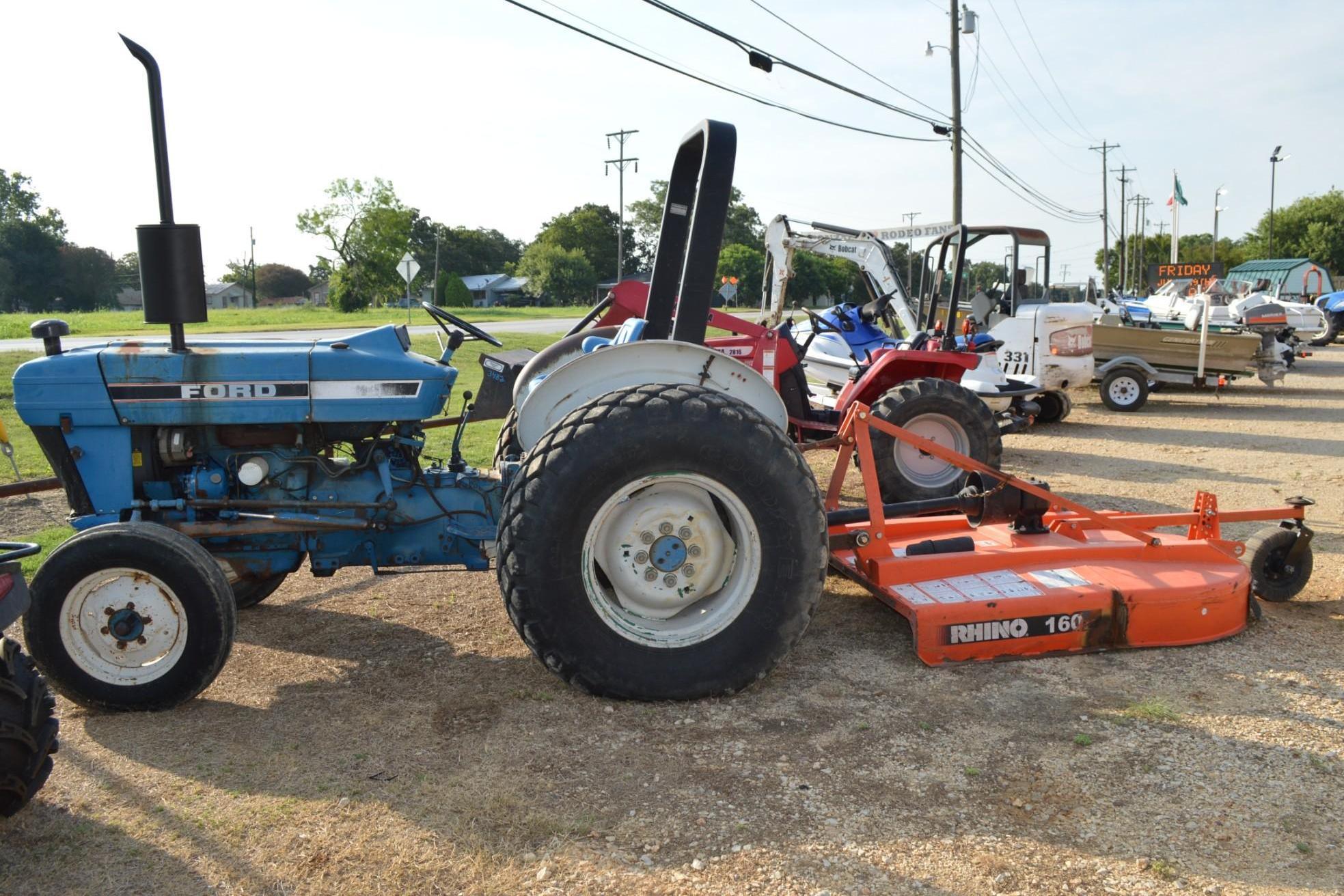 Ford 2810 2WD Diesel Tractor with 6 ft. Rhino Shredder