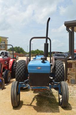 Ford 2810 2WD Diesel Tractor with 6 ft. Rhino Shredder