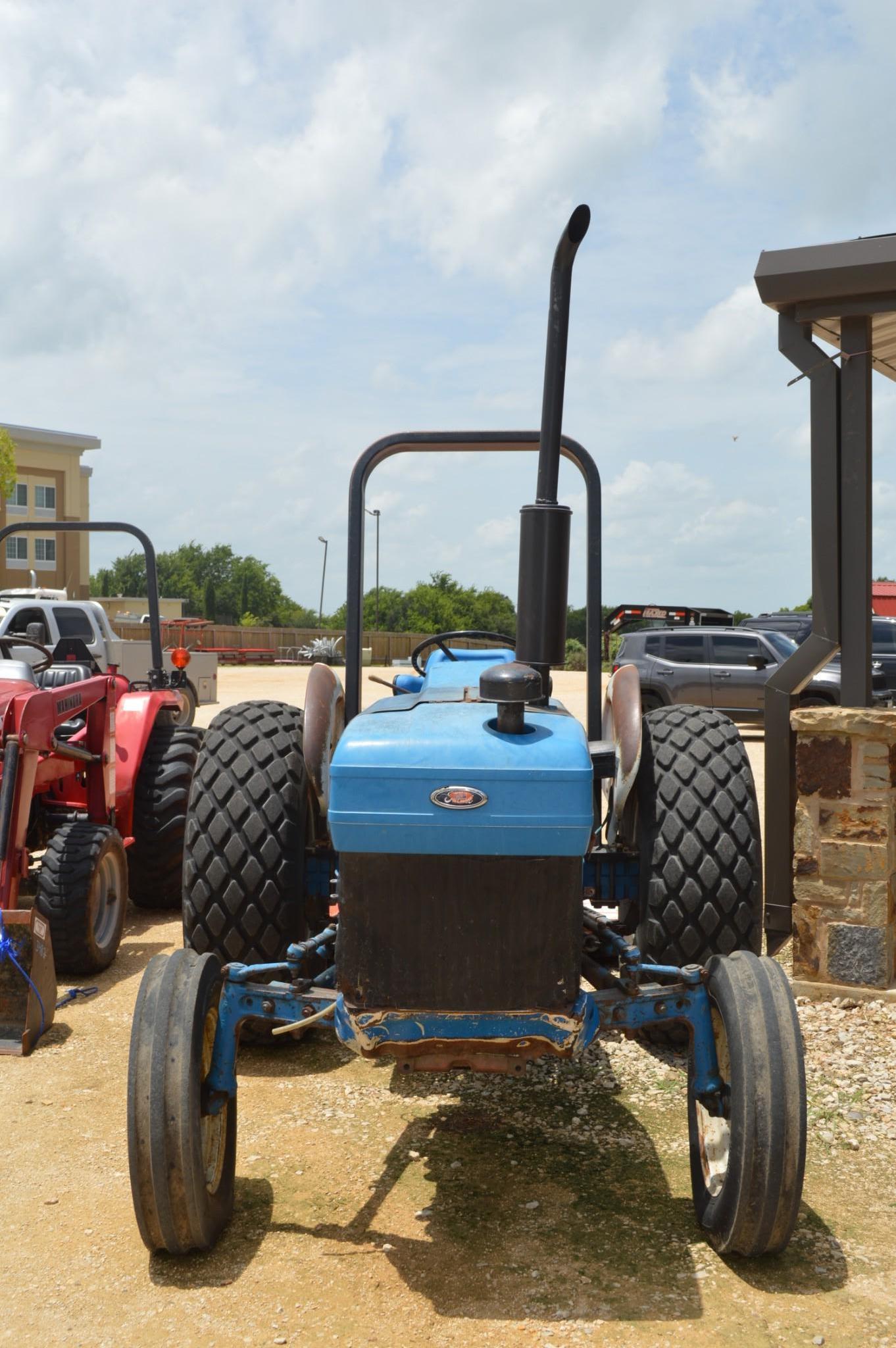 Ford 2810 2WD Diesel Tractor with 6 ft. Rhino Shredder