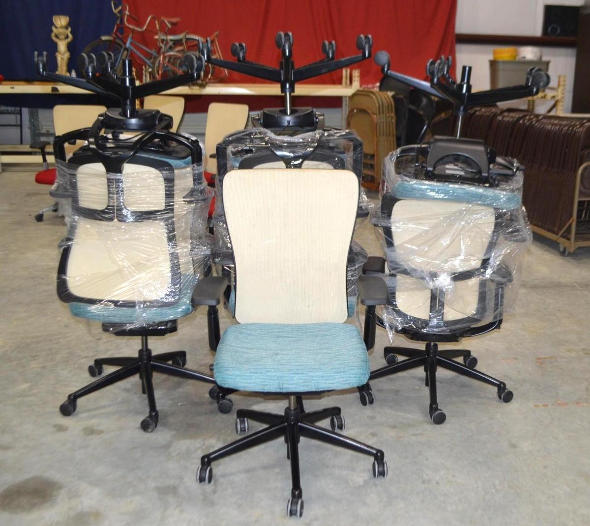 7 Turquoise/Tan Rolling Office Chairs