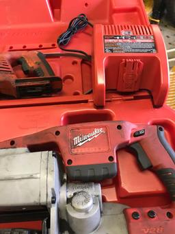 28 Volt Milwaukee Porta Band, and Sawzall, with charger. All batteries pictured do not charge