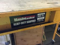 Haul-Master 900 pound rolling scaffold with walkplank and casters