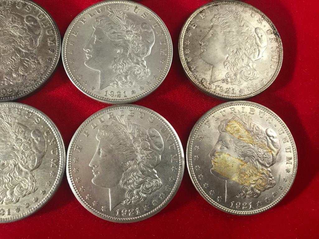(20) 1921 Morgan Silver Dollars, selling times the money.