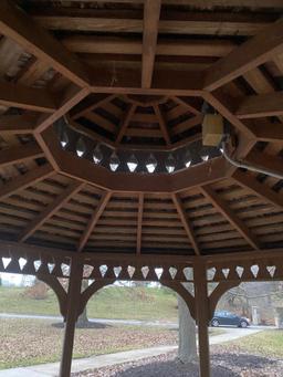 Wooden Gazebo. Octagon shaped, and approx 10 foot wide.