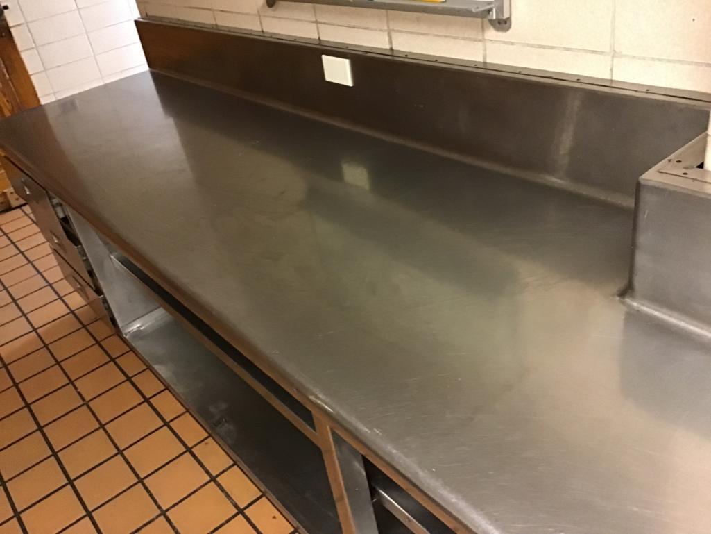 Built in Custom Stainless Steel Counter unit, with drawers 30 in. deep, 12 ft long, and 33 in. tall